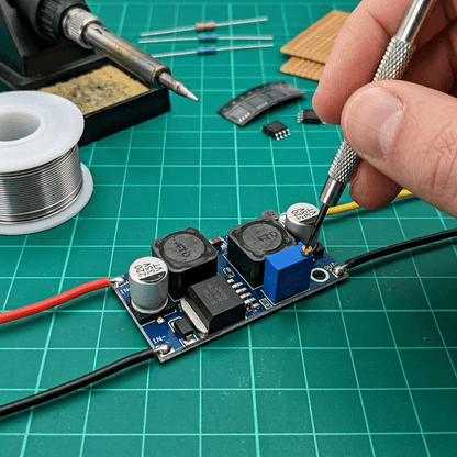 XL6009 Boost-Buck DC-DC Converter (AI generated to show input and output wiring and potentiometer adjustment)